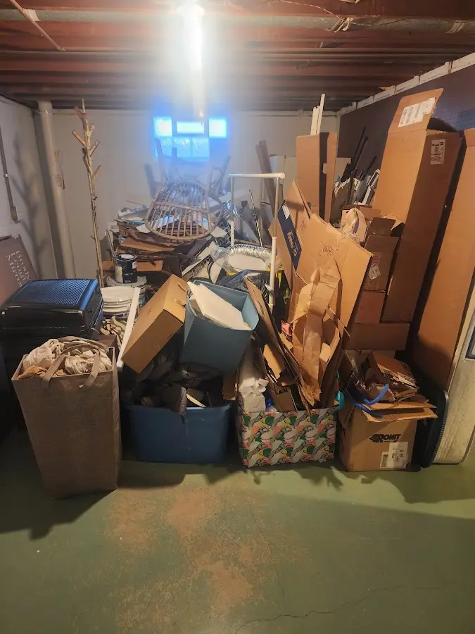 Roll-off dumpster container at job site for 2 Yard Dumpster Rental in Lennox